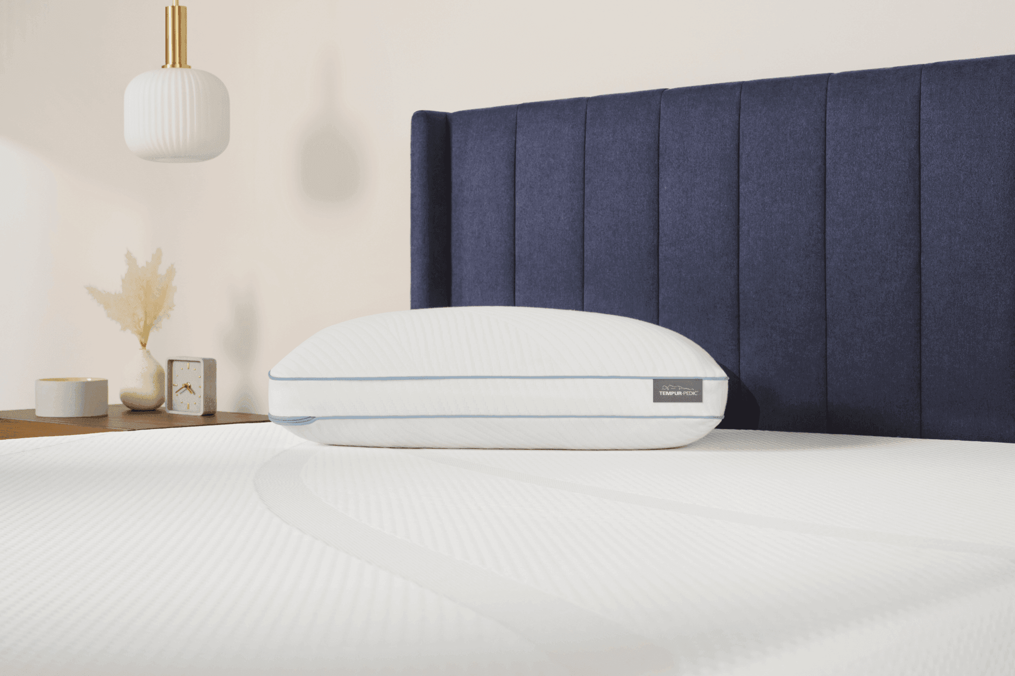 a Cloud Hybrid pillow on top of a mattress